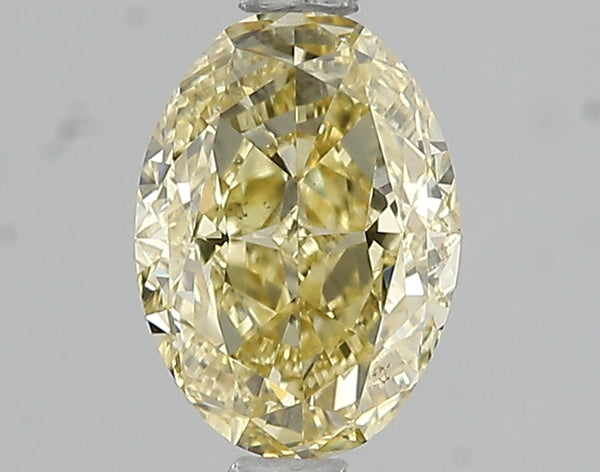 1.51ct Fancy Intense Yellow Oval Lab Diamond, VS2, IGI Certified