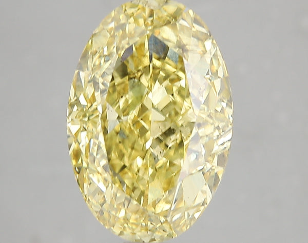5.12ct Fancy Vivid Yellow Oval Lab Diamond, SI1, IGI Certified