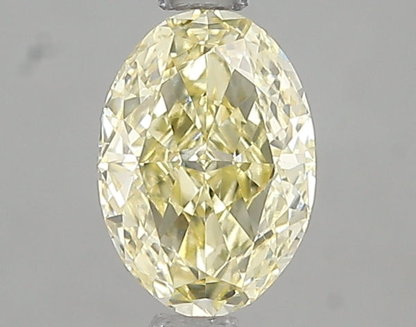 1.02ct Fancy Yellow Oval Lab Diamond, VS1, IGI Certified
