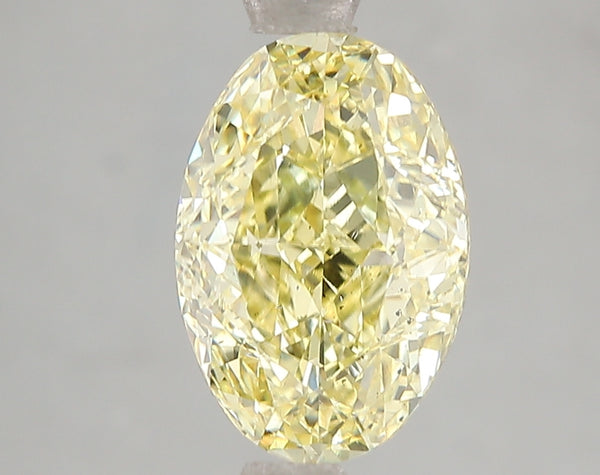 3.02ct Fancy Vivid Yellow Oval Lab Diamond, SI1, IGI Certified