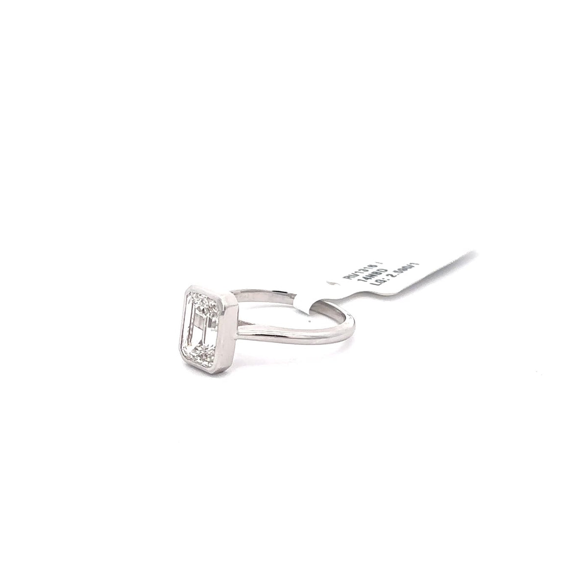 The Romy Emerald Bezel Solitaire Ring