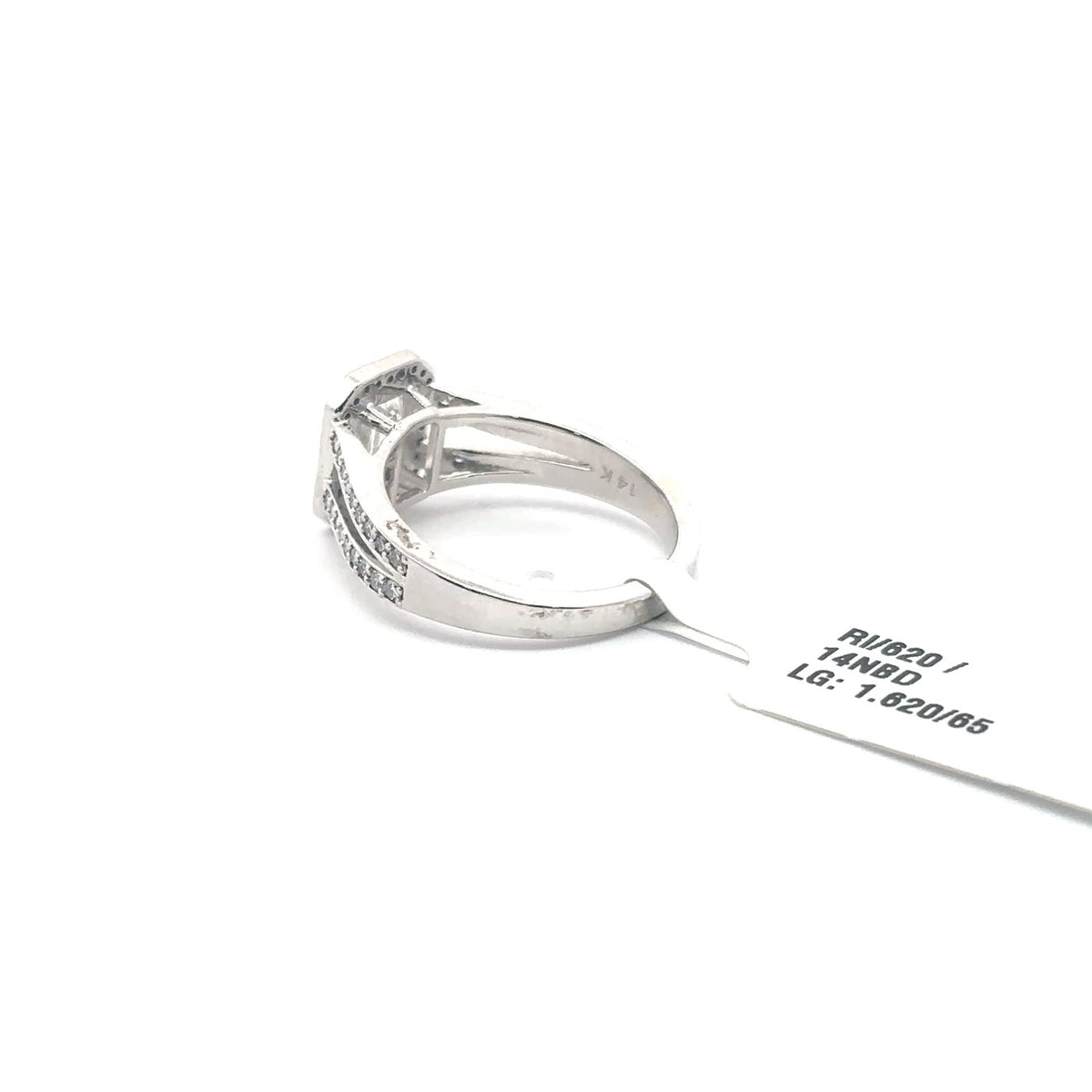 The Cécile Emerald-Cut Halo Ring