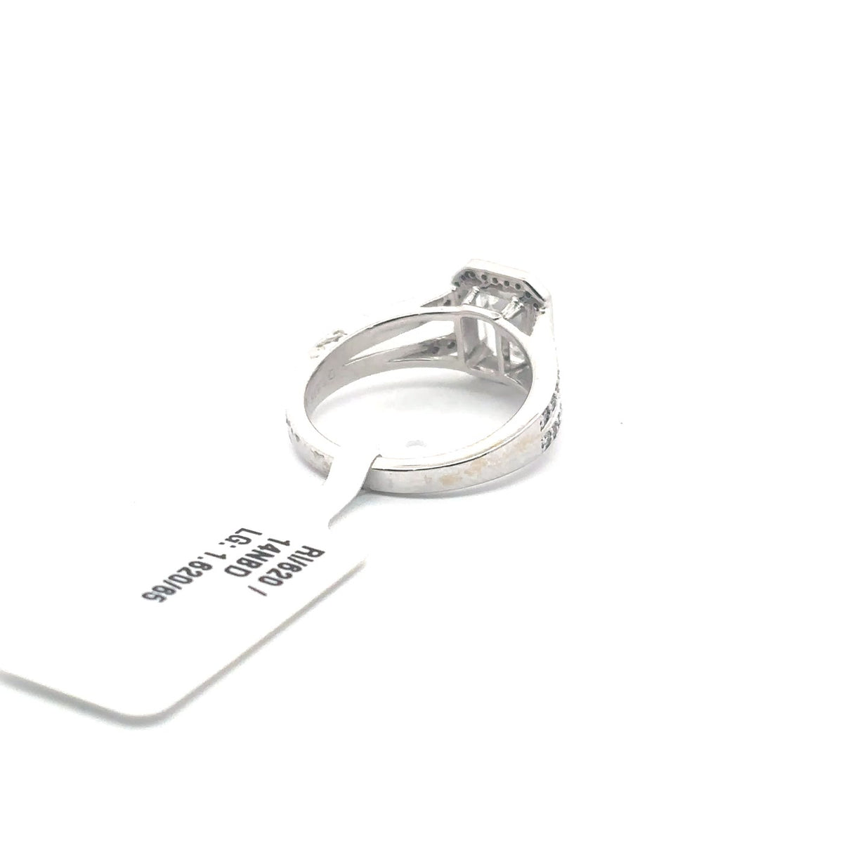The Cécile Emerald-Cut Halo Ring