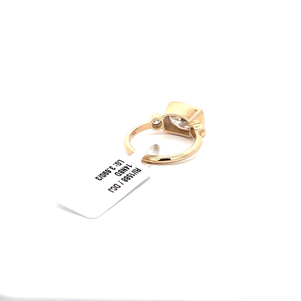 The Lucie East-West Cushion Three-Stone Ring