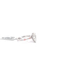 The Anaïs Pear Solitaire with Pink Accents