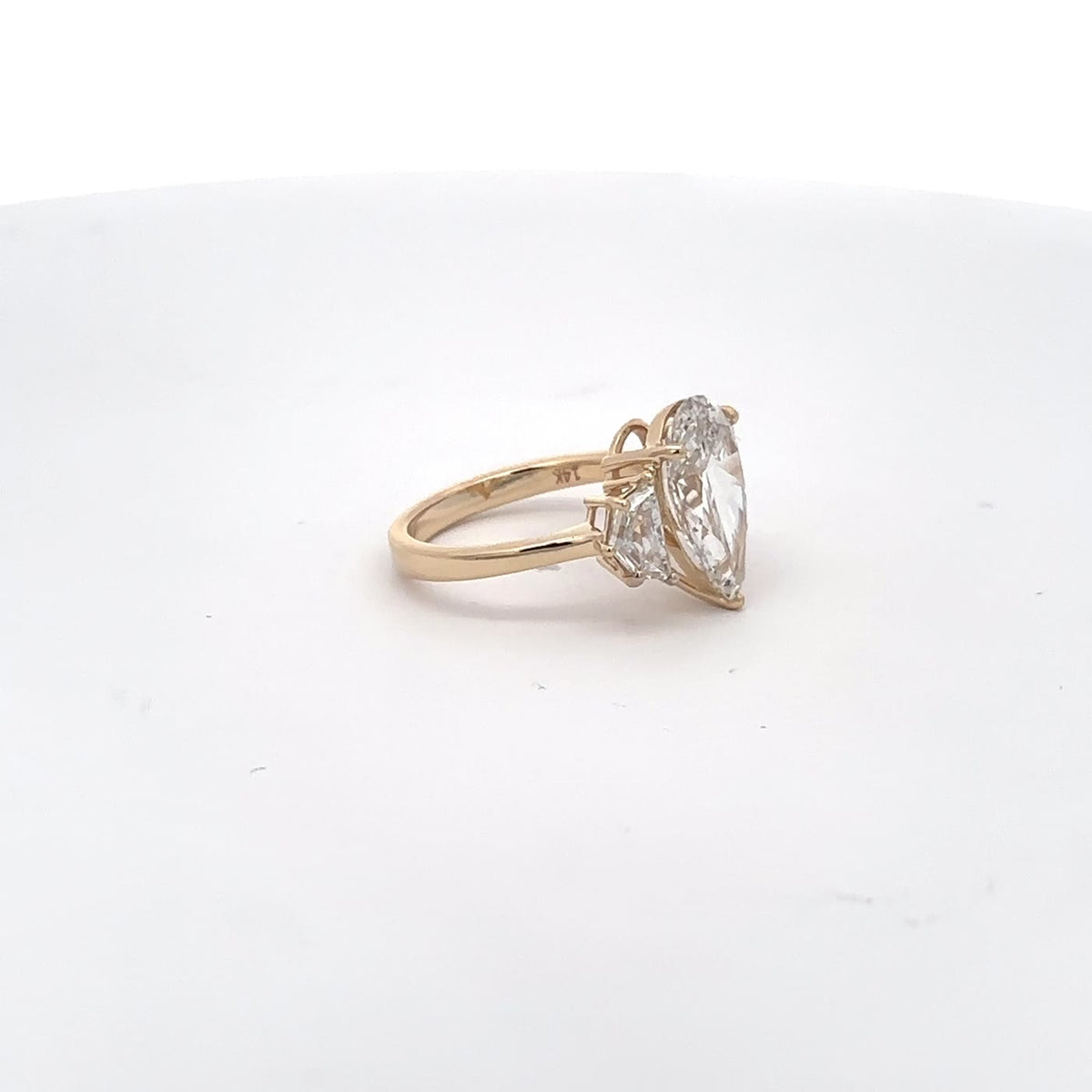 The Delphine Pear Three-Stone Ring