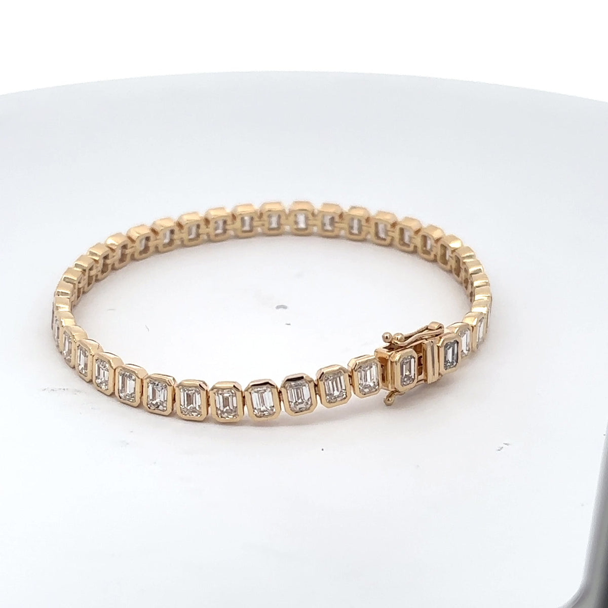 The Capucine bezel-set emerald-cut diamond tennis bracelet in 14K yellow gold