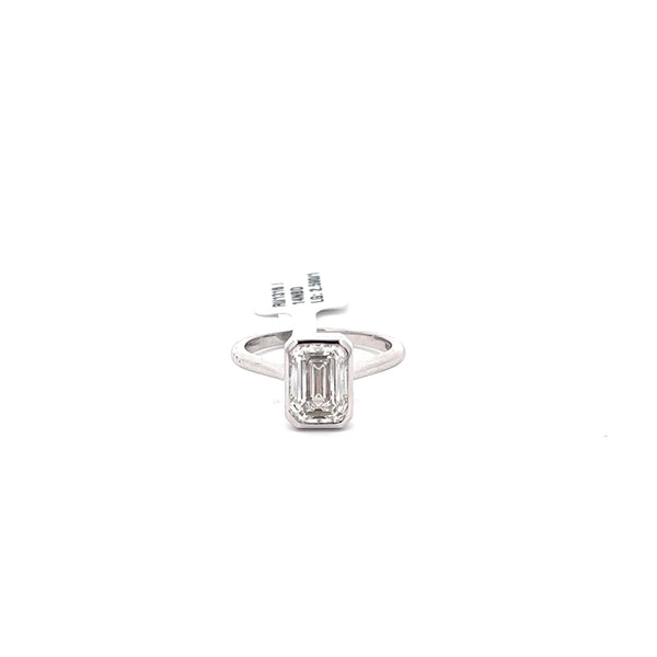 The Romy Emerald Bezel Solitaire Ring