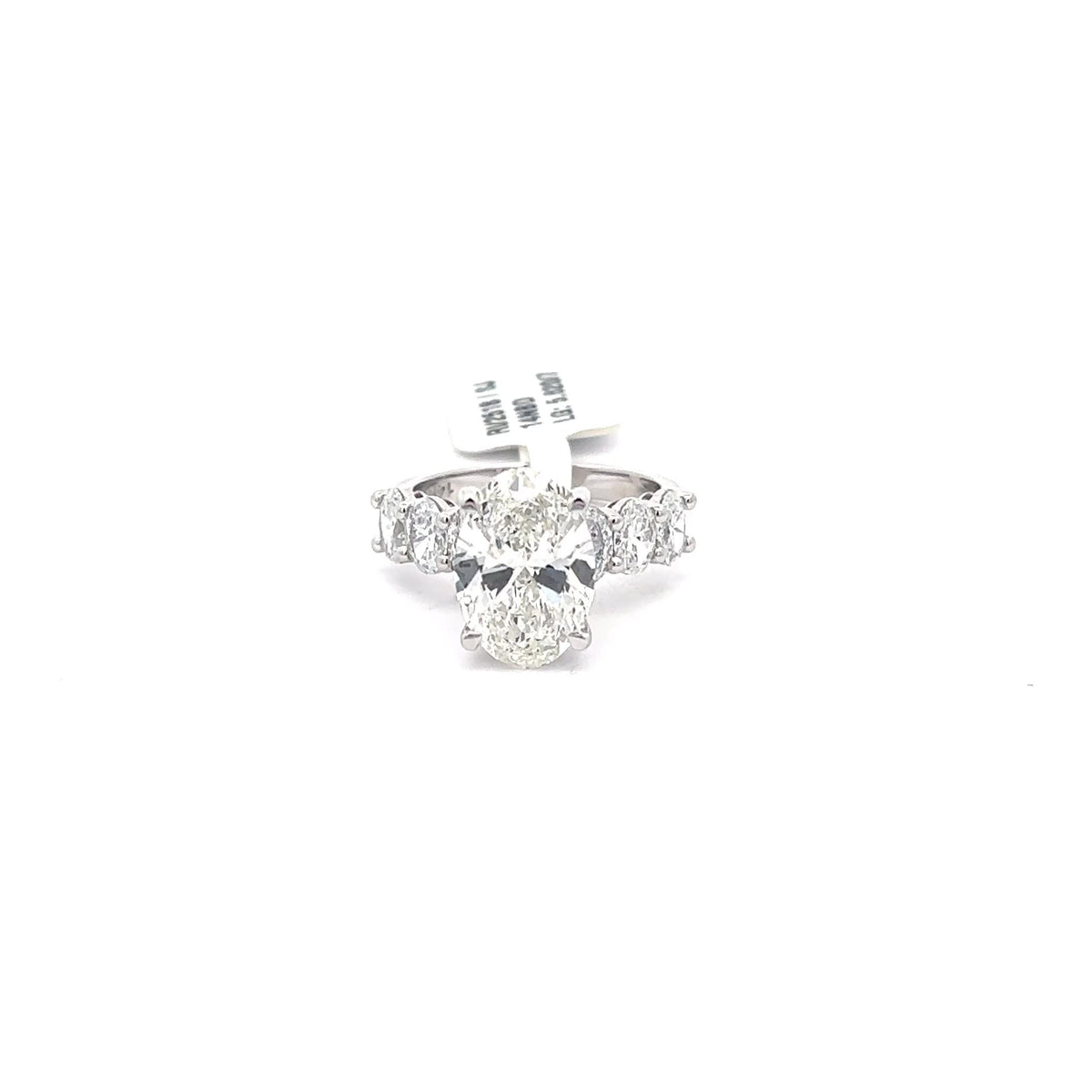 The Aurelie oval diamond ring with graduated sides in 14K white gold