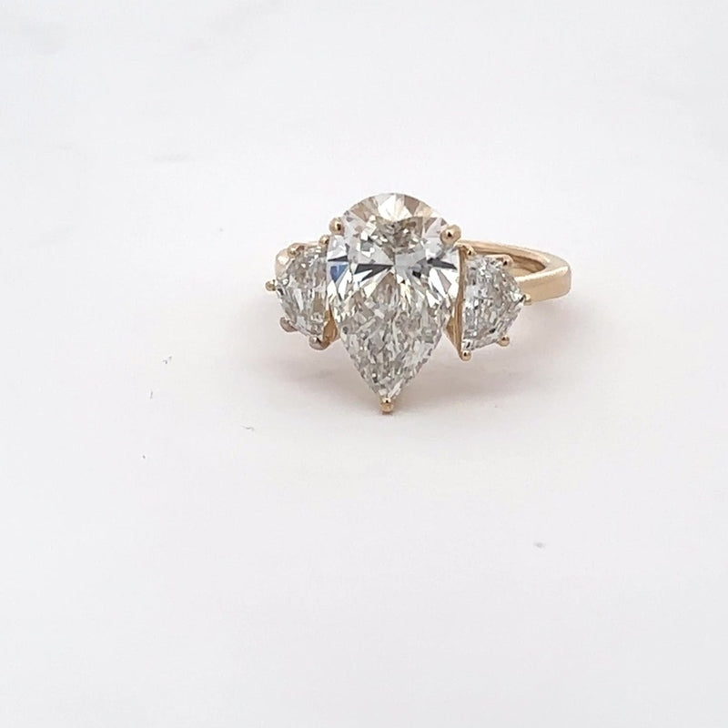 The Delphine Pear Three-Stone Ring