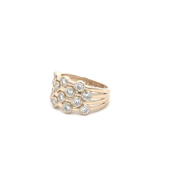 The Pleiade multi-row bezel-set diamond band in 14K yellow gold