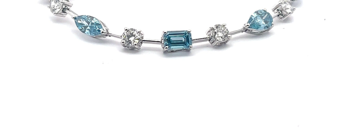 The Santorini fancy blue and white diamond tennis bracelet in 14K white gold