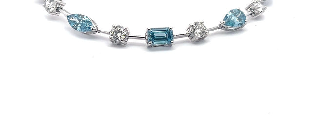The Santorini fancy blue and white diamond tennis bracelet in 14K white gold